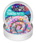 Crazy Aaron's Party Animals Thinking Putty in an open round tin filled with tiny colorful animal faces