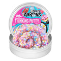 Crazy Aaron's Sweet Surprise Thinking Putty tin with candy-inspired mini pieces visible in the putty